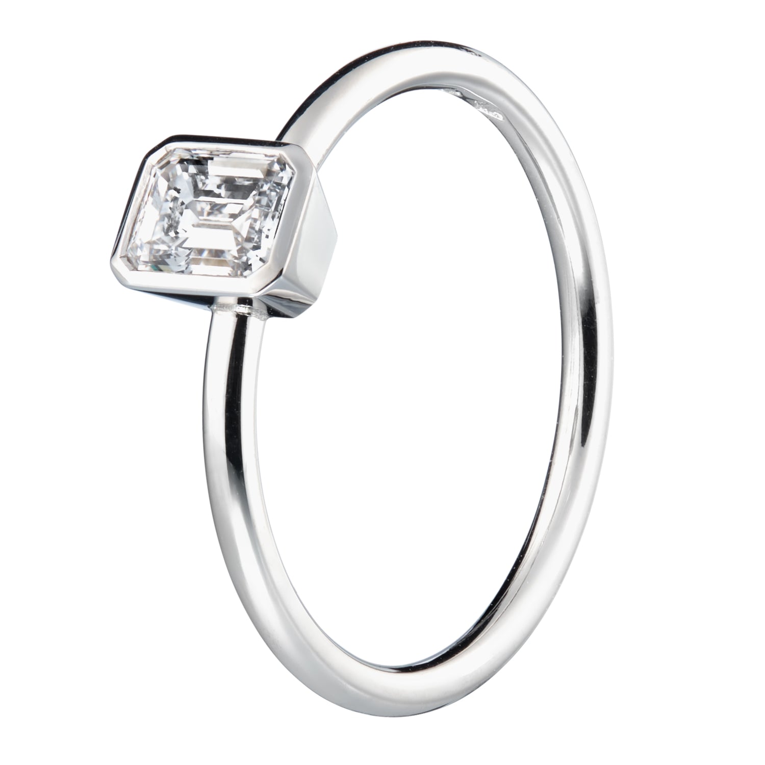 DIAMOND RING WITH EMERALD CUT DIAMOND